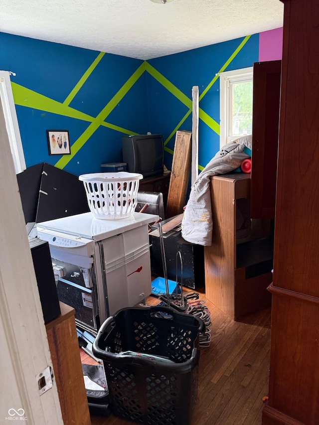 1918 14th St, Columbus, IN 47201 - bedroom featuring hardwood / wood-style flooring and a textured ceiling