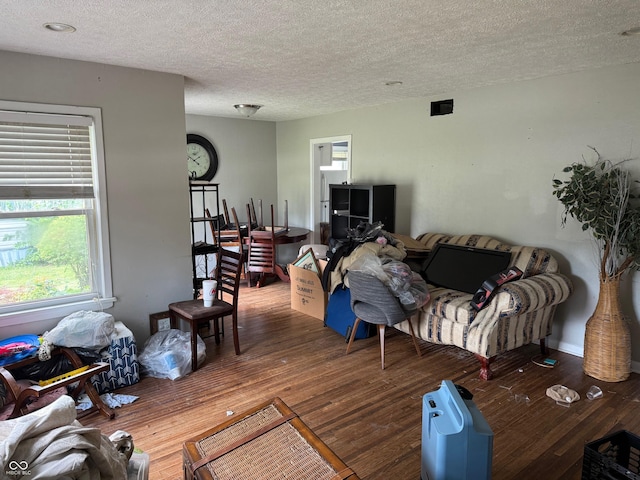 1918 14th St, Columbus, IN 47201 - living area featuring a textured ceiling and wood finished floors