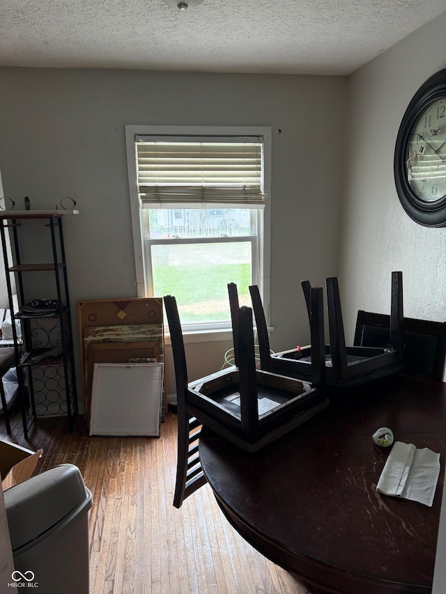 1918 14th St, Columbus, IN 47201 - dining area with wood finished floors and a textured ceiling
