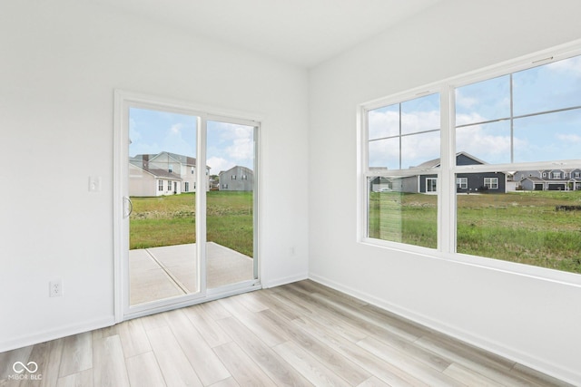 1186 Vera Blvd, Danville, IN 46122 - unfurnished room with wood finished floors and a residential view