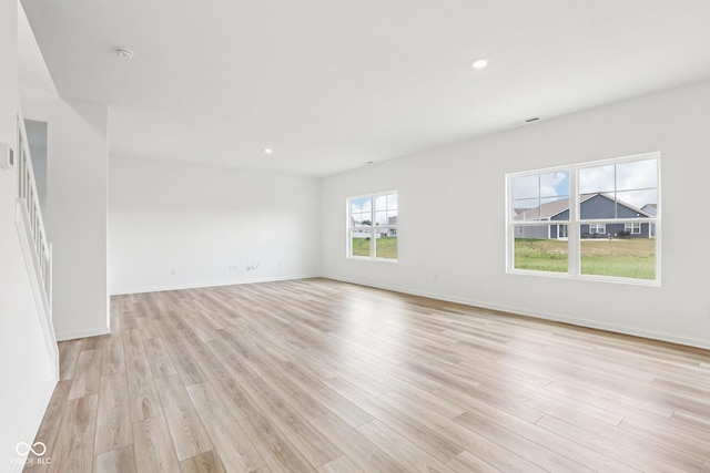1186 Vera Blvd, Danville, IN 46122 - empty room with light wood-style floors, recessed lighting, and a smoke detector
