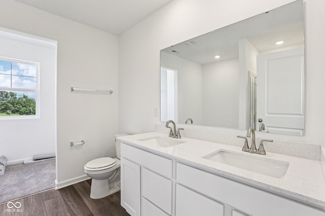 1186 Vera Blvd, Danville, IN 46122 - full bathroom featuring double vanity and wood finished floors