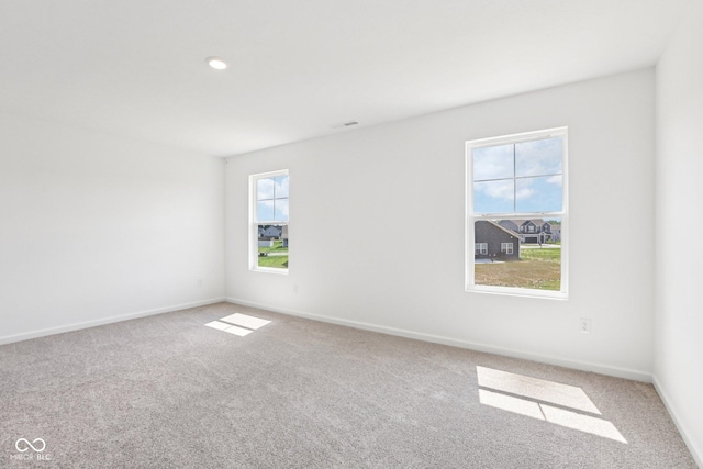1186 Vera Blvd, Danville, IN 46122 - carpeted spare room featuring baseboards and recessed lighting