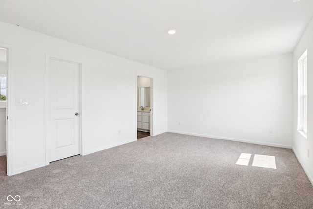 1186 Vera Blvd, Danville, IN 46122 - unfurnished bedroom with carpet flooring, multiple windows, and ensuite bath