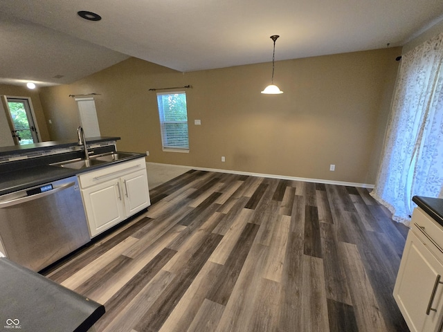 4293 Blue Spruce Ct, Greenwood, IN 46143 - kitchen featuring dishwasher, dark countertops, white cabinetry, dark wood finished floors, and vaulted ceiling