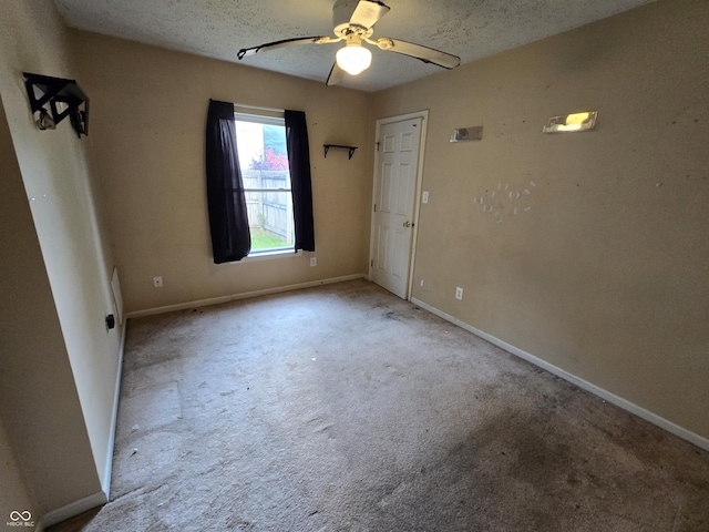 4293 Blue Spruce Ct, Greenwood, IN 46143 - spare room featuring carpet, ceiling fan, and a textured ceiling