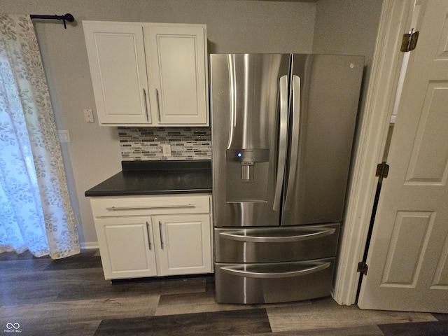 4293 Blue Spruce Ct, Greenwood, IN 46143 - kitchen with stainless steel refrigerator with ice dispenser, white cabinetry, and dark countertops