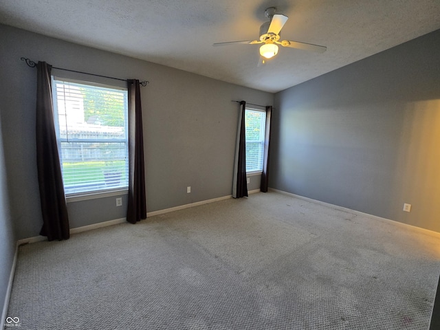 4293 Blue Spruce Ct, Greenwood, IN 46143 - unfurnished room featuring a ceiling fan, carpet floors, and a textured ceiling