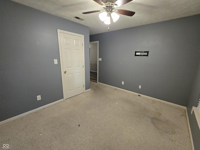 4293 Blue Spruce Ct, Greenwood, IN 46143 - spare room with ceiling fan and carpet floors