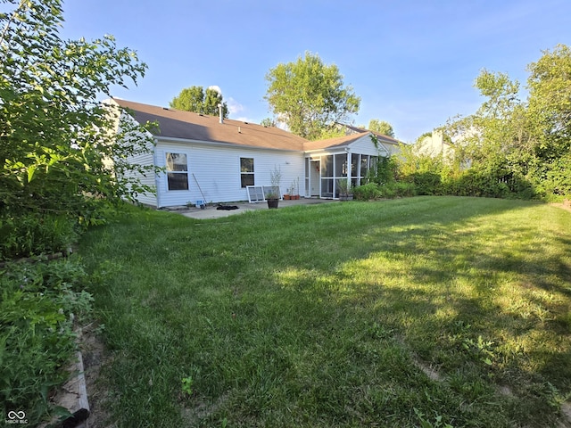 4293 Blue Spruce Ct, Greenwood, IN 46143 - back of house with a lawn, a sunroom, and a patio
