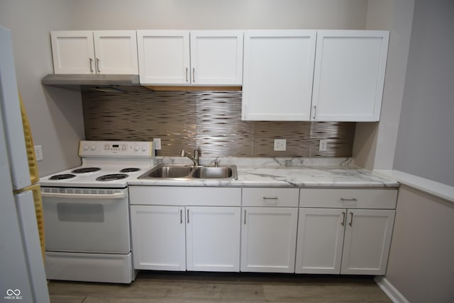 552 Jefferson Ave, Indianapolis, IN 46201 - kitchen featuring white appliances, white cabinets, wood finished floors, and light stone counters