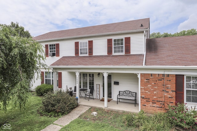 7444 Melanie Ln, Indianapolis, IN 46217 - view of front of property with a porch