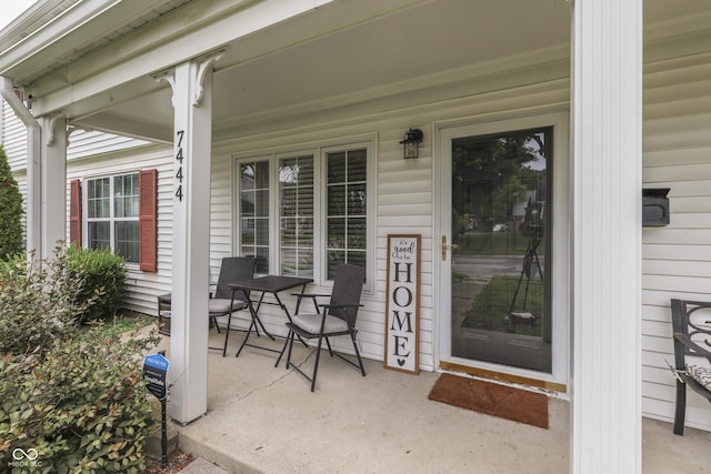 7444 Melanie Ln, Indianapolis, IN 46217 - view of exterior entry featuring covered porch