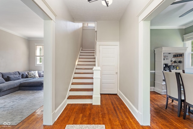 3055 N Washington Blvd, Indianapolis, IN 46205 - staircase with wood finished floors and crown molding