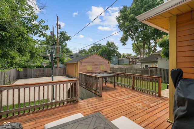 3055 N Washington Blvd, Indianapolis, IN 46205 - wooden deck with a fenced backyard, a storage shed, and a grill
