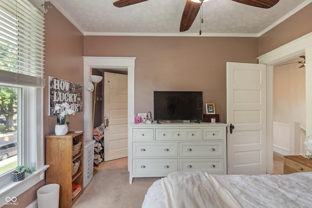 3055 N Washington Blvd, Indianapolis, IN 46205 - bedroom featuring light colored carpet, crown molding, and a ceiling fan