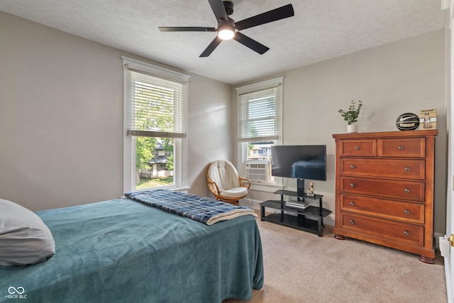 3055 N Washington Blvd, Indianapolis, IN 46205 - bedroom with light carpet, ceiling fan, and a textured ceiling