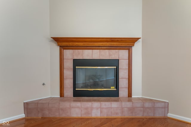 11628 Coastal Way, Indianapolis, IN 46229 - detailed view of wood finished floors and a tiled fireplace