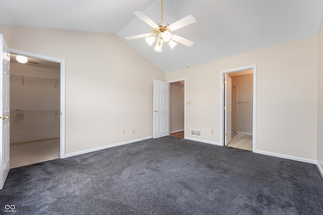 11628 Coastal Way, Indianapolis, IN 46229 - unfurnished bedroom with lofted ceiling, carpet floors, a spacious closet, and ceiling fan