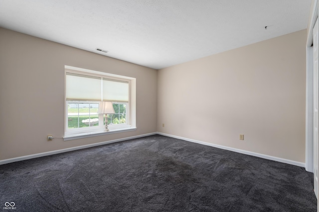 11628 Coastal Way, Indianapolis, IN 46229 - spare room with dark colored carpet and baseboards