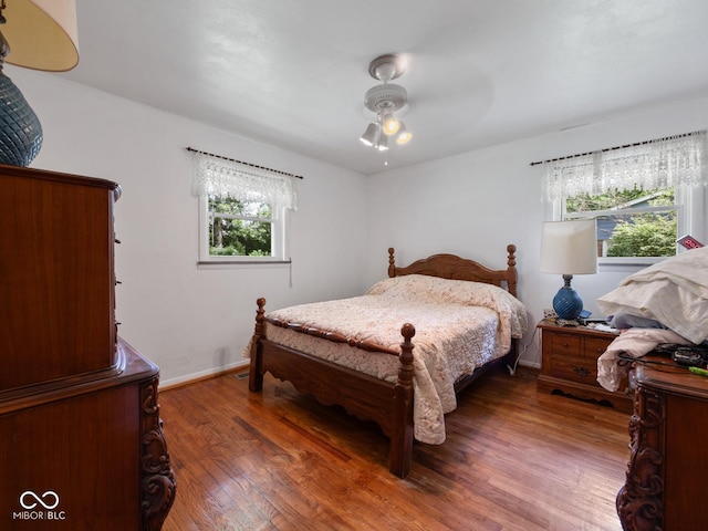 5530 Skyridge Dr, Indianapolis, IN 46250 - bedroom with wood finished floors and ceiling fan