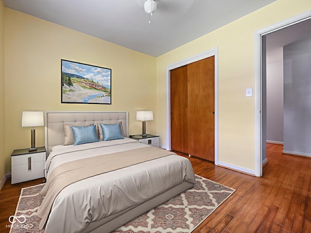 5530 Skyridge Dr, Indianapolis, IN 46250 - bedroom with wood finished floors, a closet, and ceiling fan