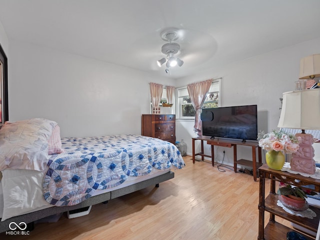 5530 Skyridge Dr, Indianapolis, IN 46250 - bedroom featuring light wood-type flooring and a ceiling fan