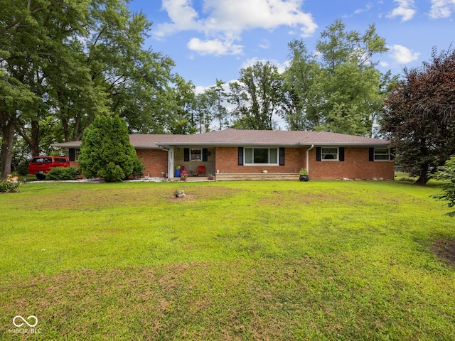 5530 Skyridge Dr, Indianapolis, IN 46250 - ranch-style home with brick siding and a front yard