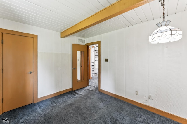 19120 Tomlinson Rd, Westfield, IN 46074 - spare room featuring beam ceiling and carpet flooring