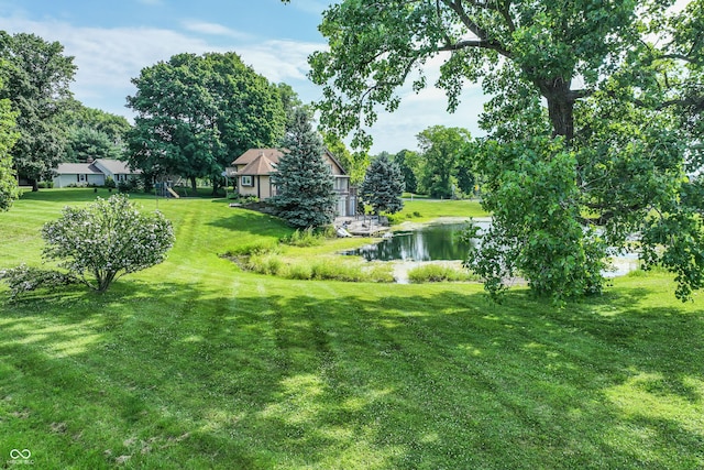 19120 Tomlinson Rd, Westfield, IN 46074 - view of green lawn with a water view