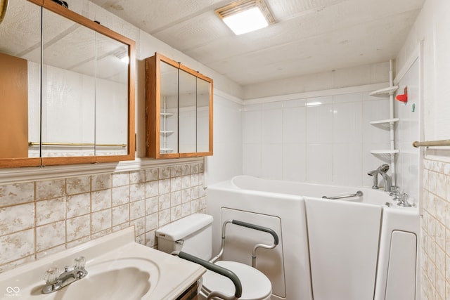 19120 Tomlinson Rd, Westfield, IN 46074 - bathroom featuring a tub to relax in, tile walls, vanity, backsplash, and a shower