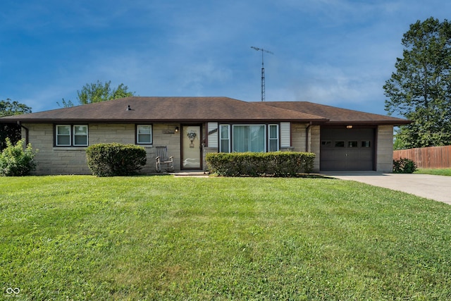 2635 15th St, Columbus, IN 47201 - ranch-style home with a garage, driveway, and stone siding