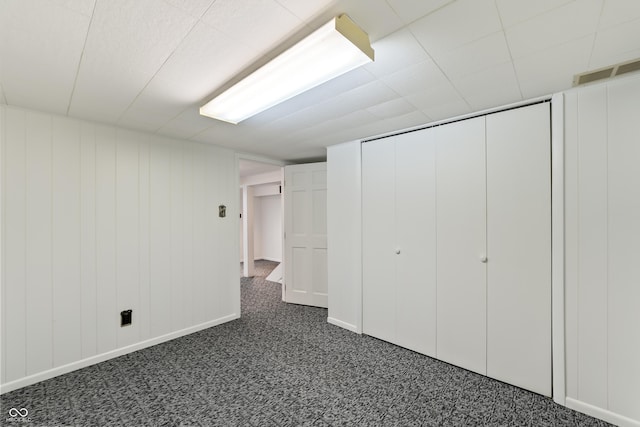 2635 15th St, Columbus, IN 47201 - unfurnished bedroom featuring dark carpet and a closet
