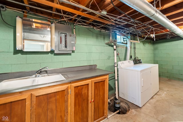 2635 15th St, Columbus, IN 47201 - laundry room with independent washer and dryer, electric panel, and cabinet space