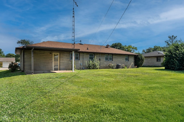 2635 15th St, Columbus, IN 47201 - rear view of property featuring a yard and a patio