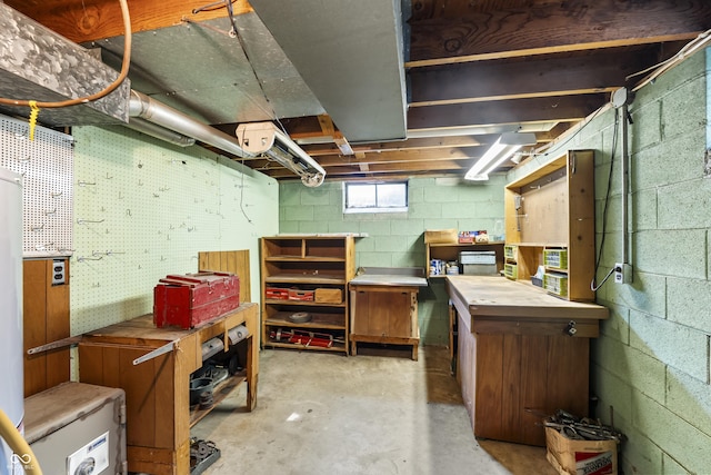 2635 15th St, Columbus, IN 47201 - basement featuring a workshop area and concrete block wall