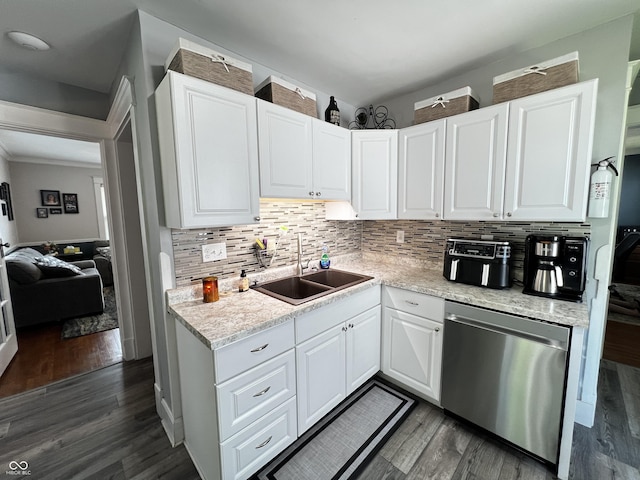 215 N Main St, Batesville, IN 47006 - kitchen featuring dishwasher, dark wood finished floors, tasteful backsplash, and white cabinets