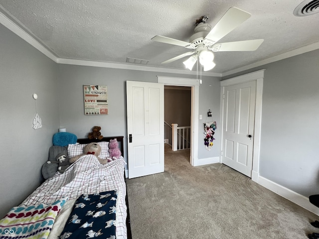 215 N Main St, Batesville, IN 47006 - bedroom with carpet flooring, a textured ceiling, ornamental molding, and a ceiling fan