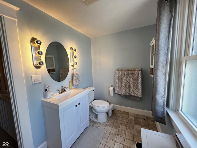 215 N Main St, Batesville, IN 47006 - bathroom featuring vanity and toilet