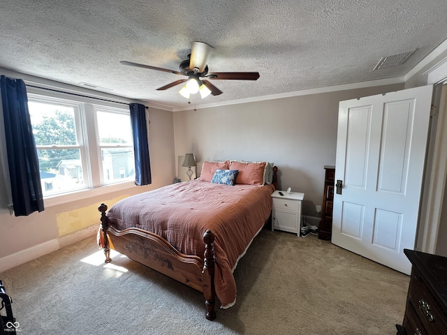 215 N Main St, Batesville, IN 47006 - bedroom featuring light carpet, ceiling fan, a textured ceiling, and crown molding