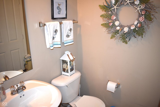 5817 Mustang Ter, Plainfield, IN 46168 - half bathroom featuring a sink and toilet