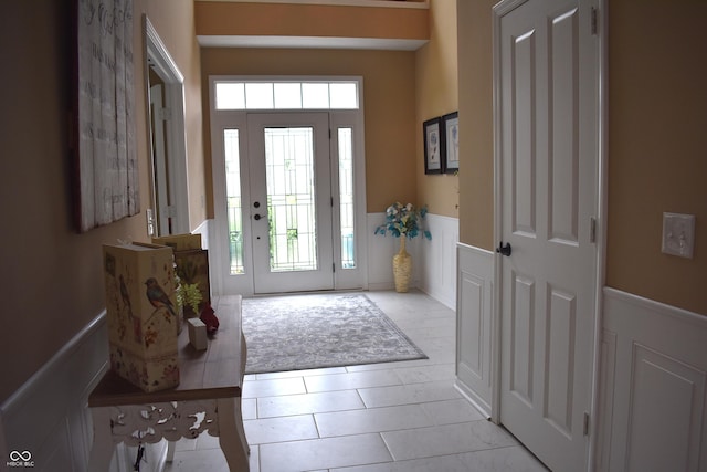 5817 Mustang Ter, Plainfield, IN 46168 - foyer with a wainscoted wall and light tile patterned floors