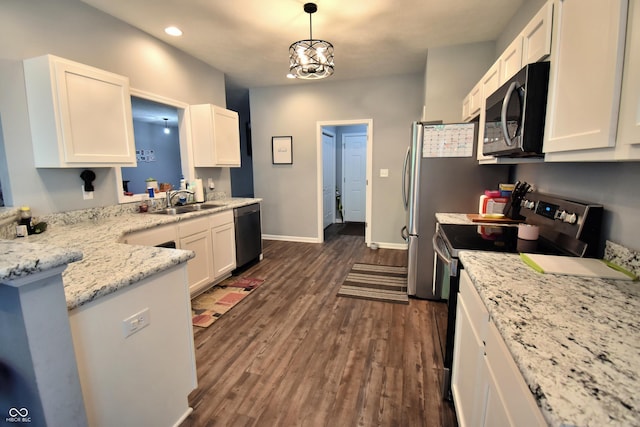 6362 W Friends Way Ct, Paragon, IN 46166 - kitchen with electric stove, stainless steel dishwasher, white cabinetry, dark wood-style floors, and recessed lighting