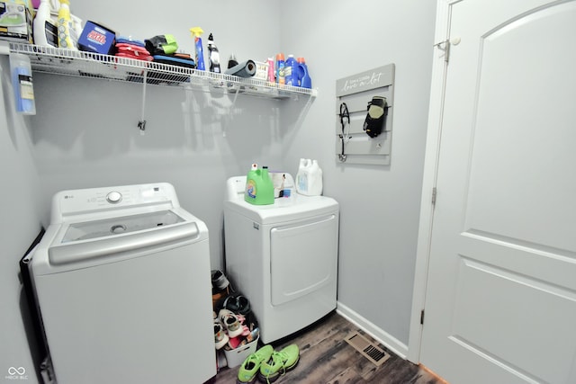 6362 W Friends Way Ct, Paragon, IN 46166 - laundry area featuring washer and dryer and dark wood-type flooring
