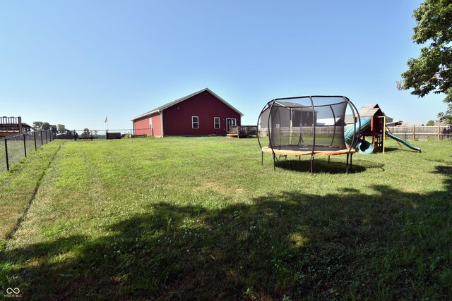 6362 W Friends Way Ct, Paragon, IN 46166 - view of yard featuring a trampoline and a playground
