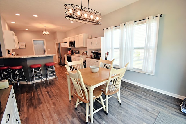 6362 W Friends Way Ct, Paragon, IN 46166 - dining area featuring a chandelier, dark wood-style flooring, and recessed lighting