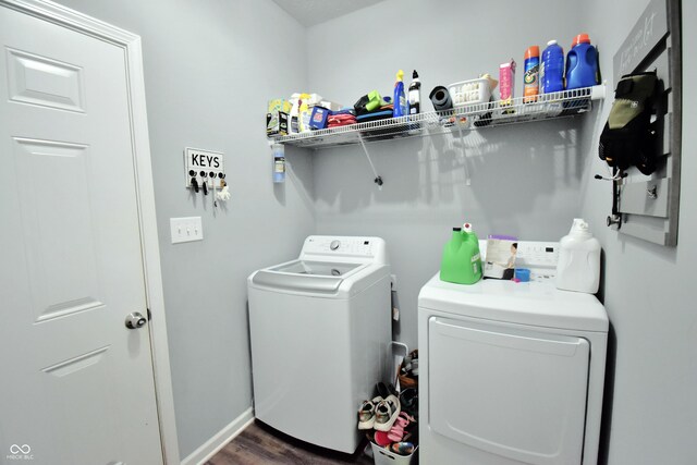 6362 W Friends Way Ct, Paragon, IN 46166 - laundry area featuring washing machine and clothes dryer and dark wood-style flooring