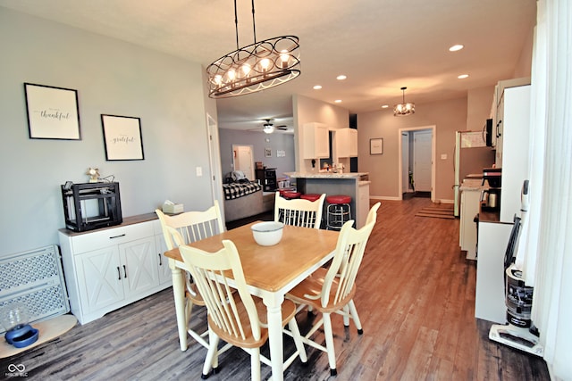 6362 W Friends Way Ct, Paragon, IN 46166 - dining room with wood finished floors, recessed lighting, a chandelier, and a ceiling fan