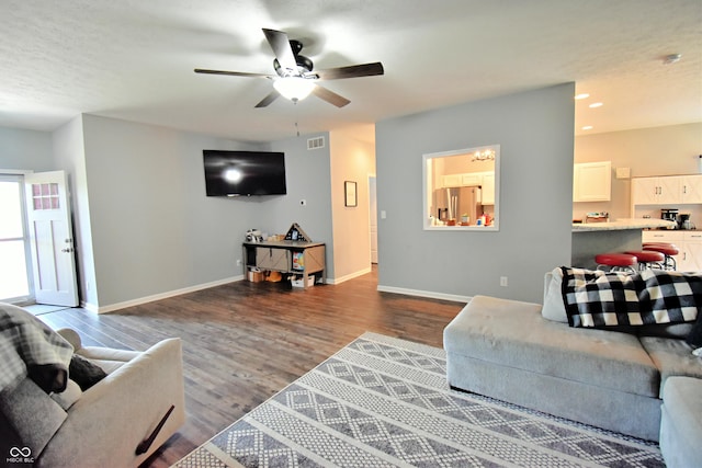 6362 W Friends Way Ct, Paragon, IN 46166 - living room with wood finished floors and a ceiling fan