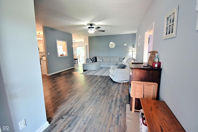 6362 W Friends Way Ct, Paragon, IN 46166 - living area featuring a chandelier, a ceiling fan, and wood finished floors